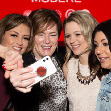 Event-Photography Four women taking a selfie together at a conference event, enjoying the moment at Moscone Center.