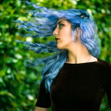 Portrait of model Kimiya Khosrovani with flowing blue hair, photographed by Coldea Productions in Tustin, CA
