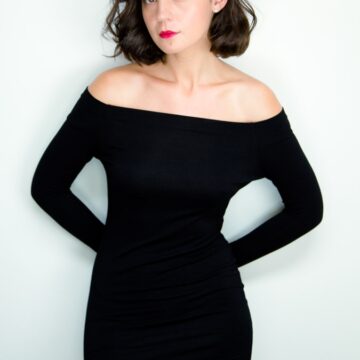 Maria-Dinulescu Professional headshot of a woman in an elegant black dress, highlighting Coldea Productions' expertise in headshot photography.