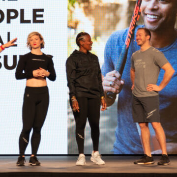Event-Photography Group of fitness professionals presenting on stage at San Jose McEnery Convention Center, captured by Coldea Productions