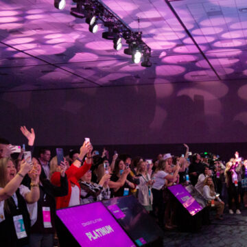 Convention-Photography This image, taken at the Long Beach Convention and Entertainment Center, showcases Coldea Productions’ professional event photography, capturing the dynamic energy of audience members and camera crews engaged at a live event.