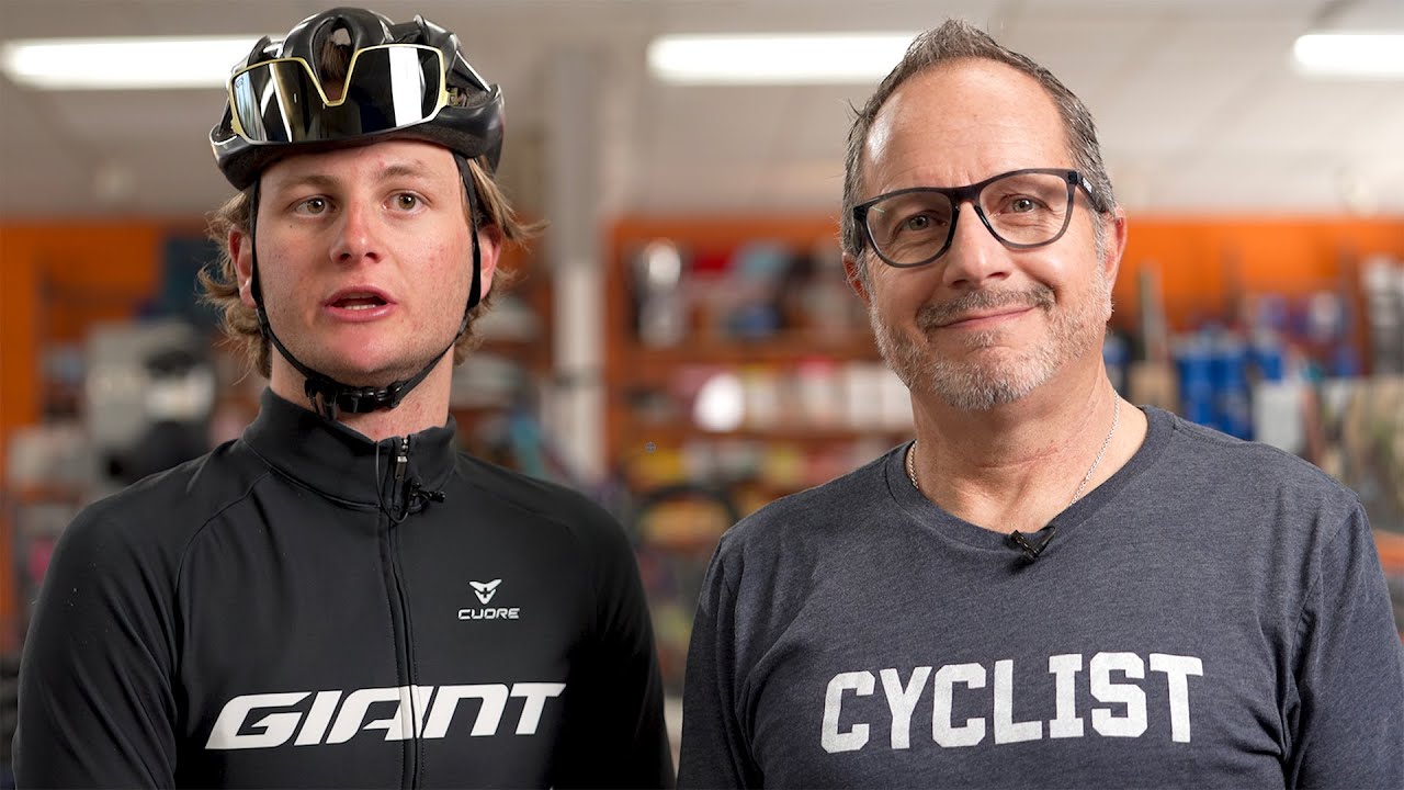 Two cyclists at Fullerton Bicycles discussing their cycling experiences and passion for the sport.