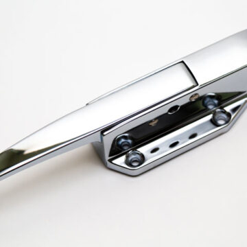Chrome handle product shot on a white background, showcasing Coldea Productions' professional product photography.