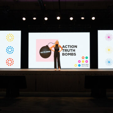 Convention-Photography Motivational speaker delivering impactful "Action Truth Bombs" presentation at Los Angeles Convention Center, captured by Coldea Productions