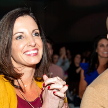 Convention-Photography Attendees engaged and smiling at Los Angeles Convention Center event, captured by Coldea Productions