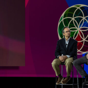 Event-Photography Panel discussion with industry leaders on stage at a convention, professionally documented through event photography by Coldea Productions at the Los Angeles Convention Center