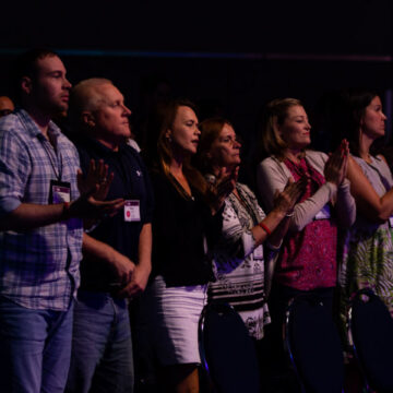 Event-Photography Audience giving a standing ovation at the Pasadena Convention Center, captured by Coldea Productions.