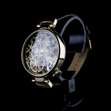Watch Product Photography This image highlights a luxury watch with a complex skeletal design and elegant brown leather strap. Coldea Productions offers high-quality product photography that captures the fine details and craftsmanship, ideal for enhancing brand presentations and marketing materials in the luxury goods industry.