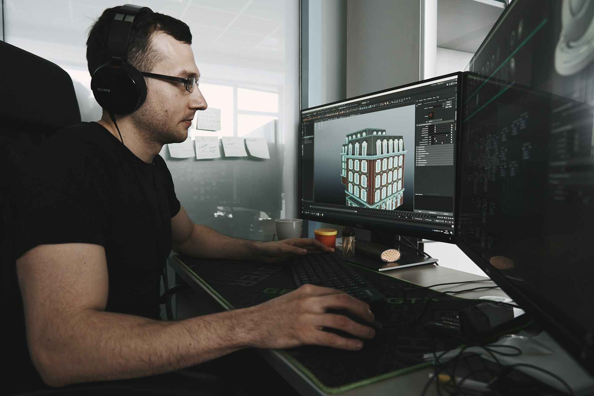 A man working on integrating 3D animation techniques into video productions.