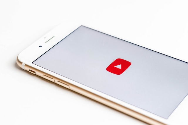 Phone with YouTube logo.