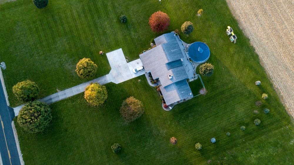 An aerial photo of a grey house