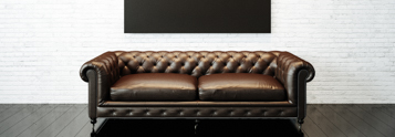 Brown leather sofa in a modern interior setting, featured in Coldea Productions' product video.