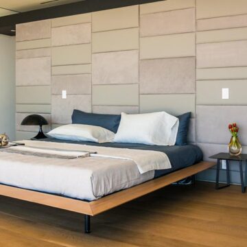Modern bedroom interior with minimalist decor, photographed by Coldea Productions for real estate marketing