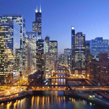 Los Angeles Convention Center skyline at dusk with illuminated skyscrapers and city lights, captured by Coldea Productions