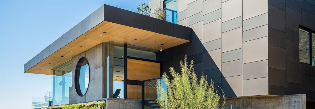 A modern luxury home exterior with sleek architectural design, representing Coldea Productions' expertise in real estate video and photography in Redondo Beach.