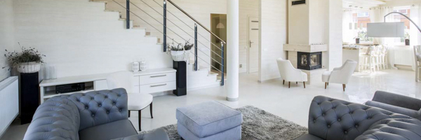 Modern luxury living room in a Dana Point property, featured in a real estate video by Coldea Productions.