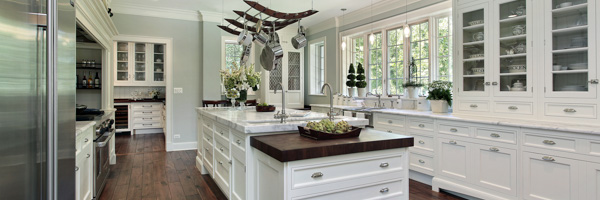 A luxurious kitchen interior with elegant cabinetry and natural lighting, representing Coldea Productions' expertise in real estate video production.