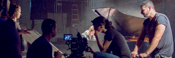 Coldea Productions filming a commercial scene with a pianist on set in City of Industry, California, using a professional camera crew and cinematic lighting.