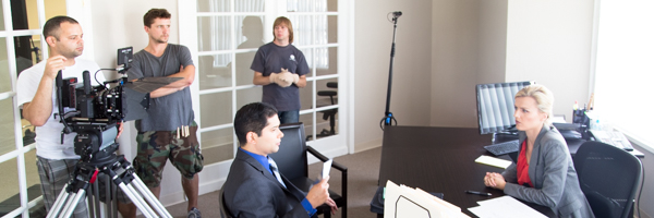 Film crew capturing a corporate office scene, part of Coldea Productions' video production services in Rancho Santa Margarita, California