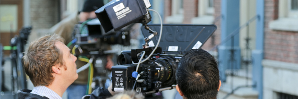 Film crew setting up cameras on an outdoor location, part of Coldea Productions' video production services in Rancho Santa Margarita, California