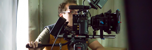 Coldea Productions videographer operating a professional camera setup during a commercial video shoot in Escondido, California.