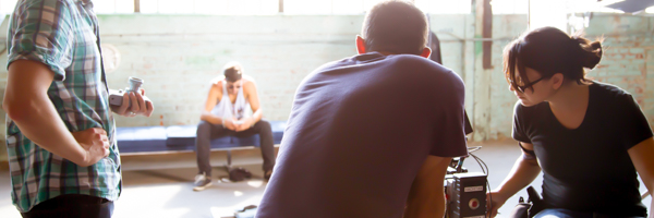 Coldea Productions crew preparing a commercial video shoot with a model on set in City of Industry, California.