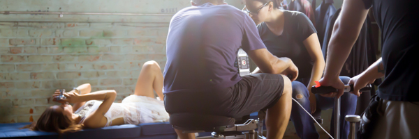 Coldea Productions crew filming a model for a commercial video on set in Chino Hills, California, with professional camera equipment and lighting.