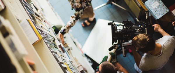 Camera crew capturing an overhead shot in a creative setting, ideal for video production services in Scottsdale, Arizona, by Coldea Productions.